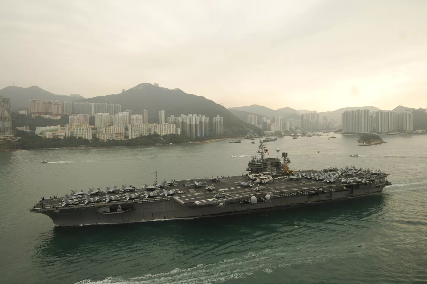 US Navy 061123-N-8591H-072 USS Kitty Hawk (CV 63) steams into Victoria Harbor for a port visit to Hong Kong after completing Annual Exercise 2006.jpg